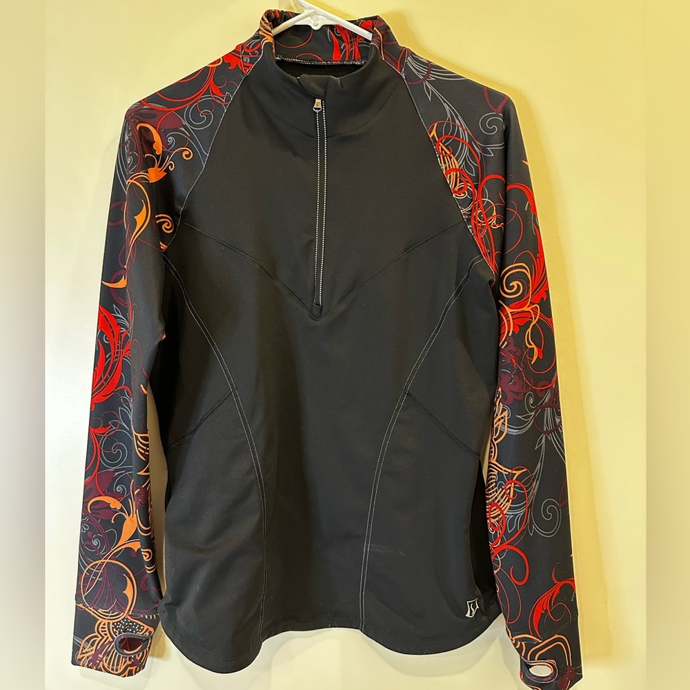 SkirtSports Black Top with Red and Orange Accents